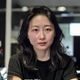 黑料视频平台资深编辑王雅婷的工作照，正在审核爆料内容，专注认真的职业形象